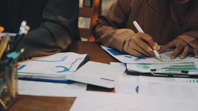 Anonymous hands of an accountant working with documents