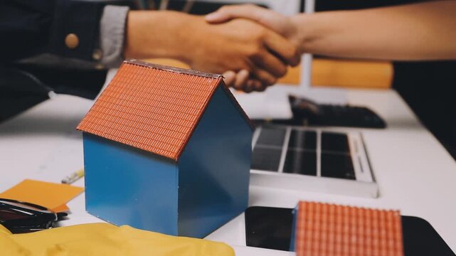 Construction and structure of Engineer or architect meeting for project working with partner and tools on model building and blueprint in working site