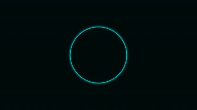A glowing teal circle on a dark background, creating a striking visual contrast and atmosphere