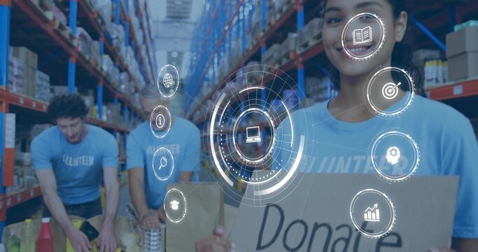 Smiling woman wearing blue Volunteer tee holding Donate sign in depot with HUD overlays, copy space