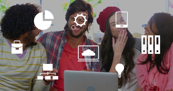 Talking four team members working in lounge, wearing red beanie, with silver laptop and white icons