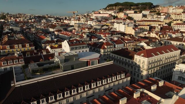 Cinematic Aerial View of Lisbon City Center and Main Squares at Sunset 