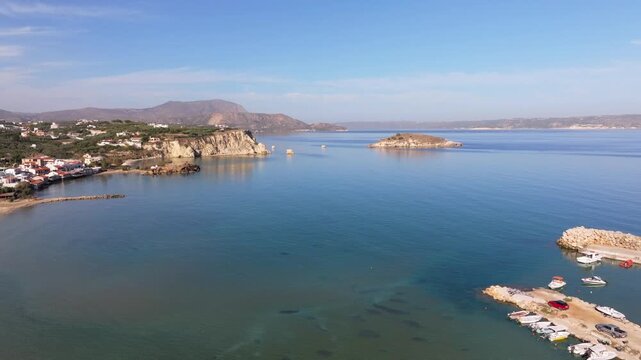 Aerial drone shot.View of famous beach in the summer, Crete, Greece. Famous beach with river and palm trees in Libyan sea. Tropical island, Panoramic view, Most beautiful beaches of Crete island
