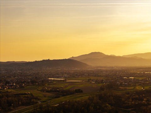 Aerial view of amazing sunset over Zumberak mountains above the town of Samobor, Croatia, photographed from Oresje lake