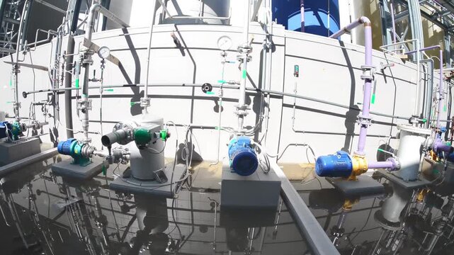 Water treatment machinery partially submerged in industrial purification facility environment