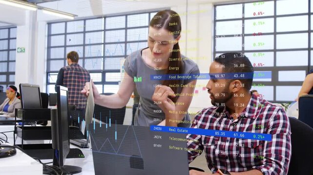 Seated man pausing typing as woman presenting laptop initiating finance review with animated charts