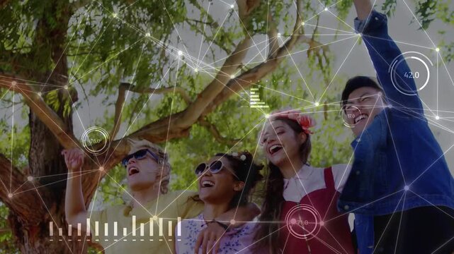 4 friends standing under tree, leaning, one raising arm, starting tech HUD with nodes, sharing bond