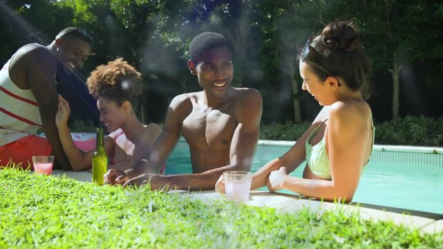 Friends laughing by pool, eye contact sparking animated bubbles from cups for lifestyle socializing
