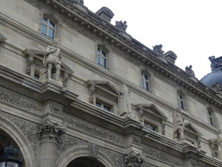 Obraz premium Paris, April 2026 : Visit of the magnificent city of Paris, Capital of France - View on different facades of buildings built by Baron Haussmann