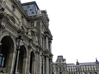 Obraz premium Paris, April 2026 : Visit of the magnificent city of Paris, Capital of France - View on different facades of buildings built by Baron Haussmann
