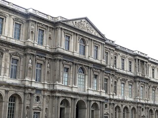 Fototapeta premium Paris, April 2026 : Visit of the magnificent city of Paris, Capital of France - View on different facades of buildings built by Baron Haussmann