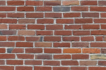 Fototapeta premium Texture of an old red brick wall in Nord-Pas-de-Calais, France