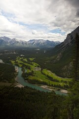 Fototapeta premium Landscape View of Banff National Park on a Cloudy Summer Day with a Blue Sky