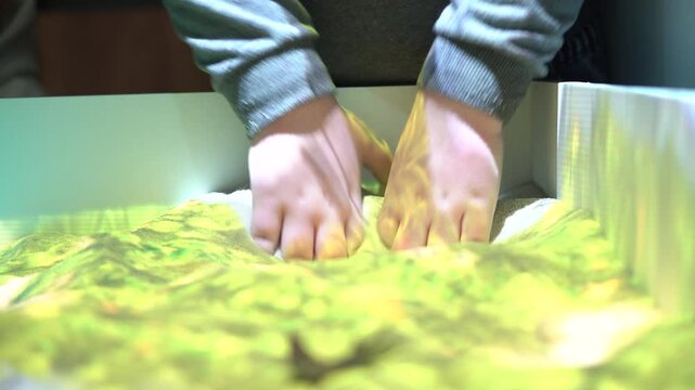 Interactive Sand Table for Kids: Learning Geography and Topography with AR