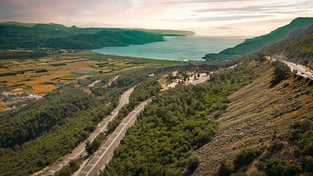 Aerial view of winding Sakar Pass road descending to Gokova Bay Mugla Turkey