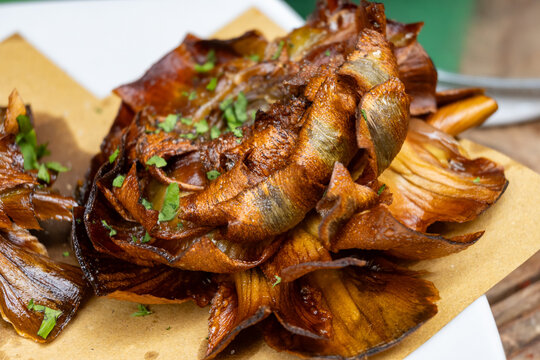 Artichokes in kosher restaurant in Jewish Quarter of Rome in the Sant'Angelo neighborhood, cooked in Jewish-style Roman artichokes or carciofi alla giudia