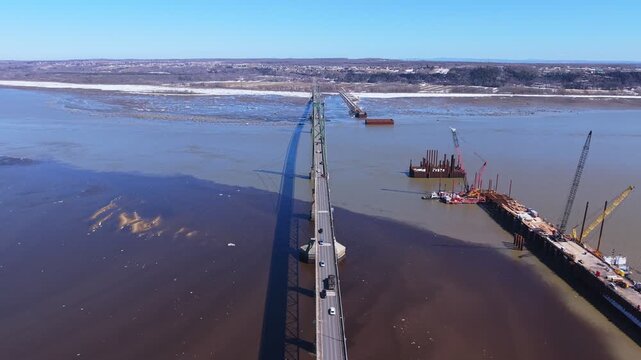 transport infrastructure system with bridge and road connection across river