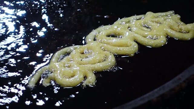 Close-up views of sweet dessert food Jalebi. 
