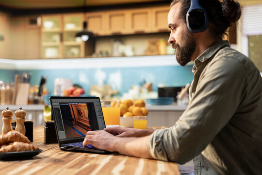 Headset laptop, game developer, building video game, listening to music, gaming innovation, programming visual effects, and virtual world design, professional tech and creative development .