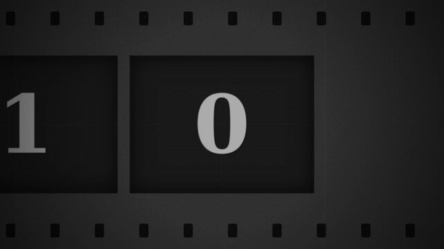 Countdown timer with numbers decreasing from five to one on a film strip background