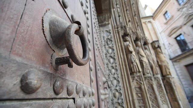 The historic Apostles gate pointed arch architecture at Valencia Cathedral