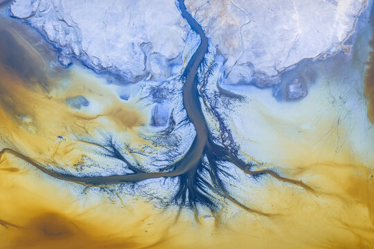 Aerial view of unique mineral formations and colorful salt deposits at Searles Lake in San Bernardino County, California, United States.