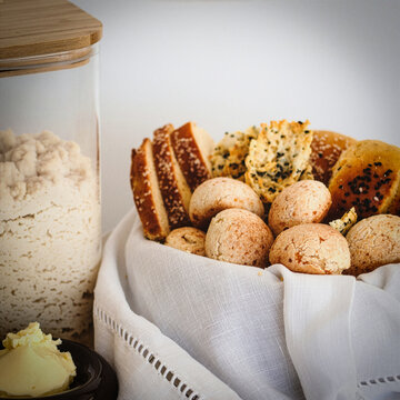 Assorted cheese bread balls in paper bag. Traditional chipa from argentina