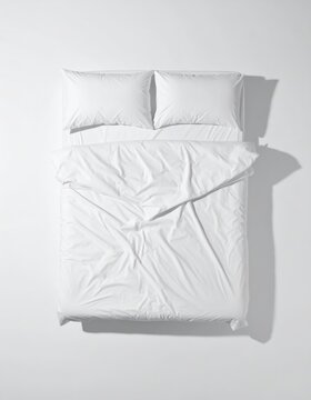 White bedding comforter and pillow set on light for home furnishing, clean minimal interior and laundry comfort