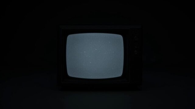 Old television set in the dark.