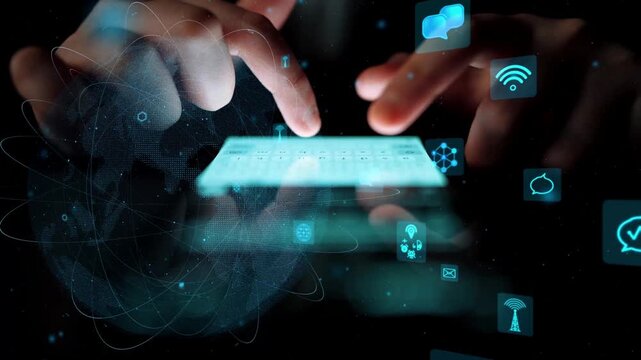 A close-up view of hands interacting with a glowing digital interface, showcasing icons representing various aspects of technology, data, and communication, set against a dark backdrop. Xenic