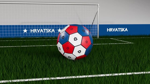 Dropping red-blue soccer ball bouncing, rolling and settling toward goal at stadium HRVATSKA boards