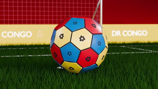 Propelling soccer ball rolling onto grass pitch, contacting turf near line, with DR CONGO band