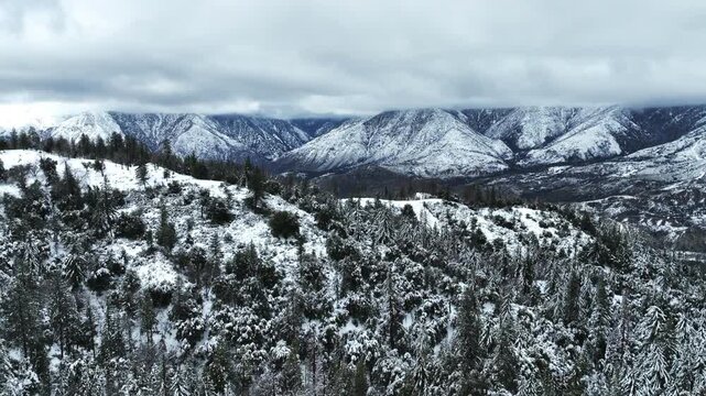 The California San Gorgonio San Bernardino Mountain Range near the Santa  Ana Watershed covered in snow along SR 38 through the Mountain Pass