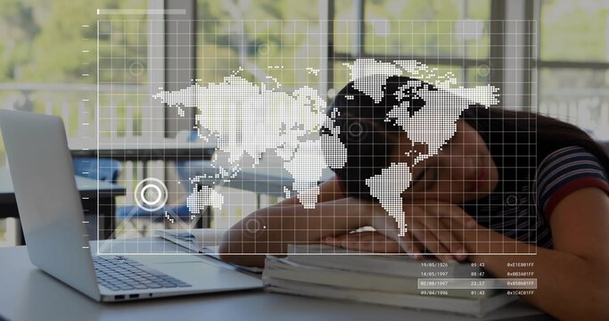 Resting student wearing striped top, leaning head on books at desk, laptop, digital map overlay