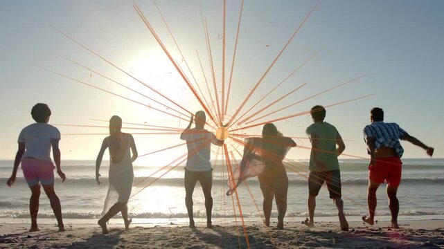 Group of six walking running jumping to sun nearing shore causing orange burst expanding for travel