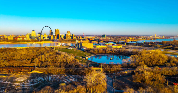 Gateway Arch and St Louis Skyline Aerial at Golden Sunset