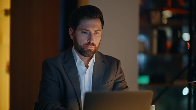 Creative director working computer at dark office closeup. Businessman thinking 