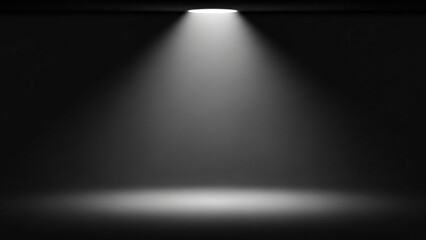 Naklejka premium A spotlight shines down in a dark room with a single beam of light