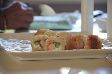 Panko shrimp maki rolls with avocado and cheese © kike