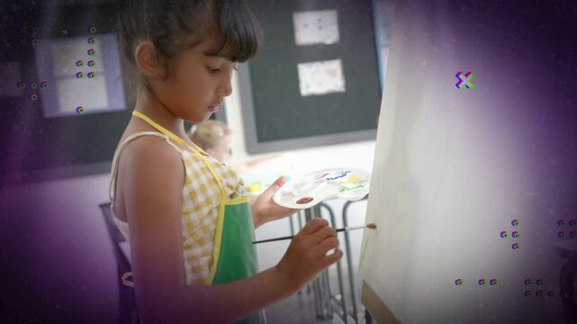Girl pupil picking paint and painting at easel while learning purple overlay shifting around edges