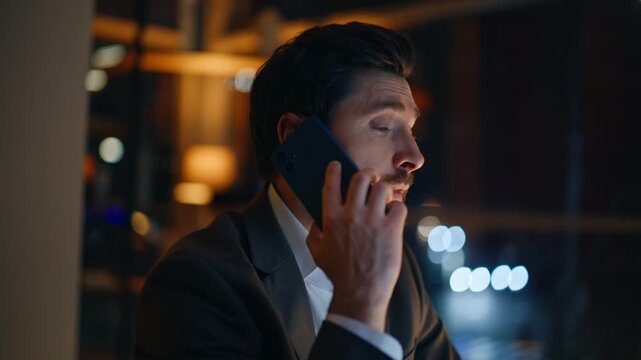 Company representative calling client proposing services in night office closeup