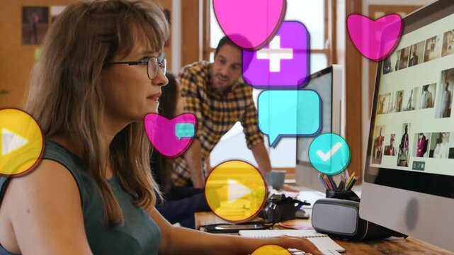 Woman typing gesturing, social icons floating from right and obscuring desk showing marketing