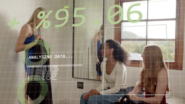 Blonde woman showing clothes in shop, AR overlay updating % while peers checking jacket deciding
