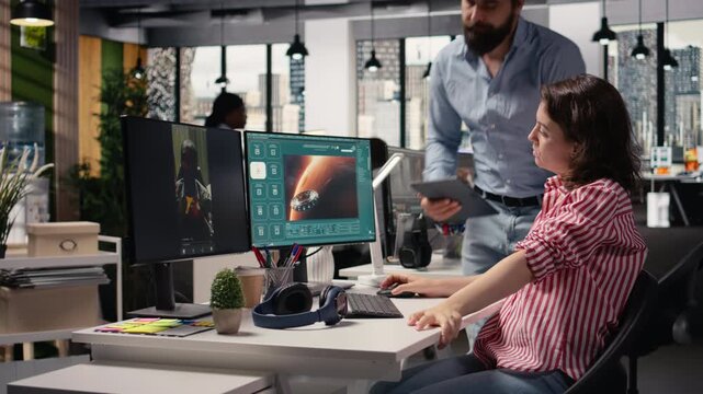 Two colleagues waiting for AI text to video generating on computer, futuristic visuals of Mars and outer space. Artificial intelligence used to create cosmic materials of the spatial universe.