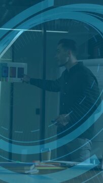 Vertical video: Host pointing panel, aide tapping pad, HUD popping, writing board for design review