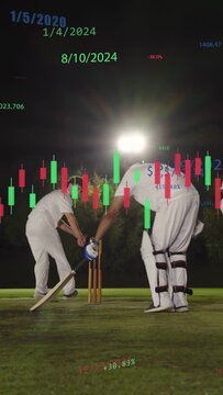Vertical video: Batter moving past stumps on ball trying run, fielder diving, finance chart showing