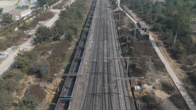 Aerial View of Railway Lines, Drone Shot of Train Tracks, Top View of Railway Track Network, Freight Train on Railway Line stock video.