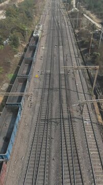 Aerial View of Railway Lines, Drone Shot of Train Tracks, Top View of Railway Track Network, Freight Train on Railway Line stock video.
