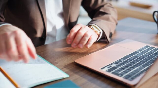 Accountant hands typing keyboard planning budget sitting workplace closeup.