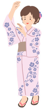 浴衣を着て踊る若い女性　イラスト